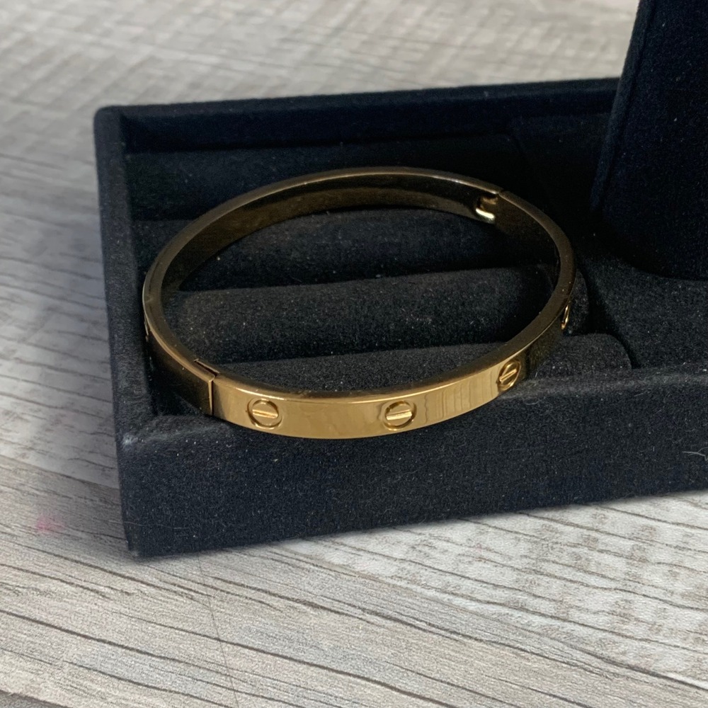 Gold Tone Screw Motif Hinge Bangle Bracelet 6.5 Inch Oval Cuff